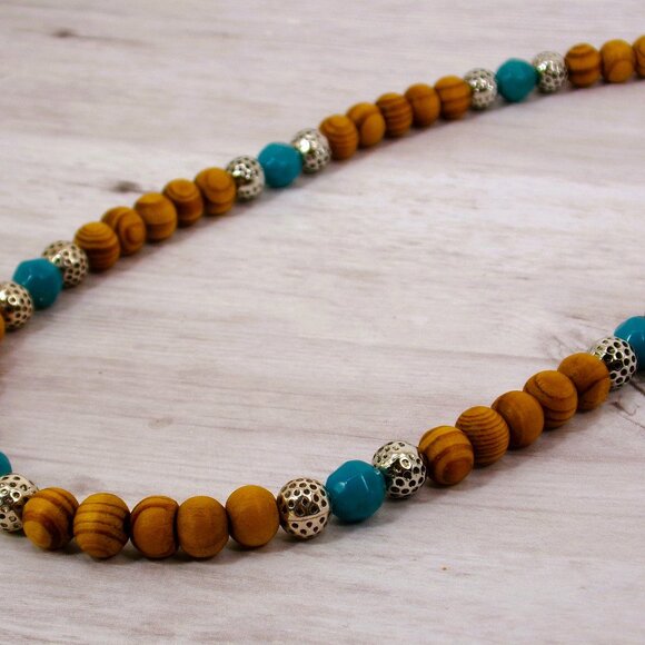 Wood bead necklace created with turquoise color beads and textured silver beads. - Picture 7 of 11